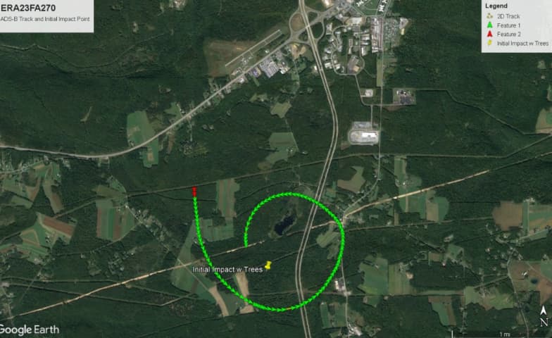 Satellite map showing the ADS-B flight track of the Piper PA-30 N7628Y near Ebensburg, Pennsylvania, in green, forming a circular pattern ending at the marked initial tree impact site.
